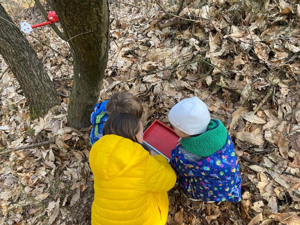 May be an image of 2 people and tree