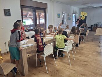 Četrti dan počitniškega varstva – v družbi risanja, kitare in čarovnij