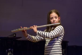 Nastop prvošolcev posvečen materinskemu dnevu