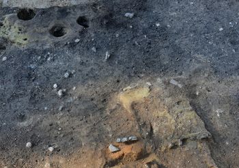 Na območju stare telovadnice je bilo v času kulture žarnih grobišč stanovanjsko naselje