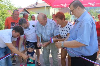 Foto utrinki: Odprtje kanalizacije, ceste in javne razsvetljave v Razdelju