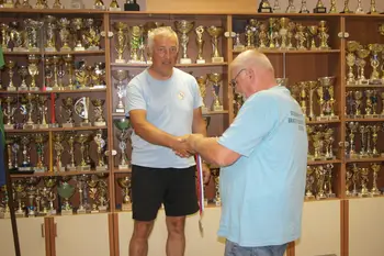 Predaja srebrne medalje Janezu Pintarju