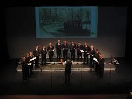 Moški pevski zbor Rožmarin na dobrodelnem koncertu in reviji pevskih zborov