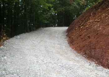 Asfaltiranje ceste na Brezovici pri Medvodah
